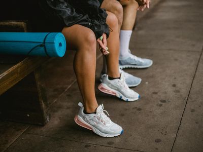 Close up of sports shoes and a comfortable mat