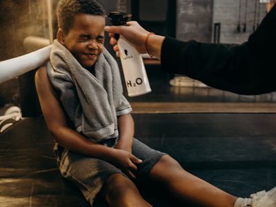 Selection of soft towels and water bottle for training